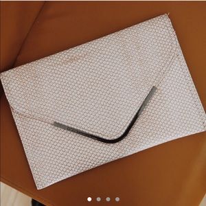 BCBGeneration pink faux-snakeskin oversized clutch